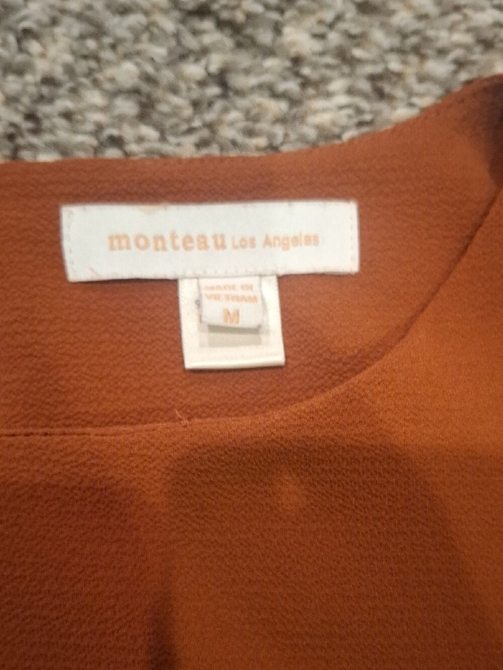 Women’s Rust Sleeveless Ruffle Shell Top - Picture 2 of 9